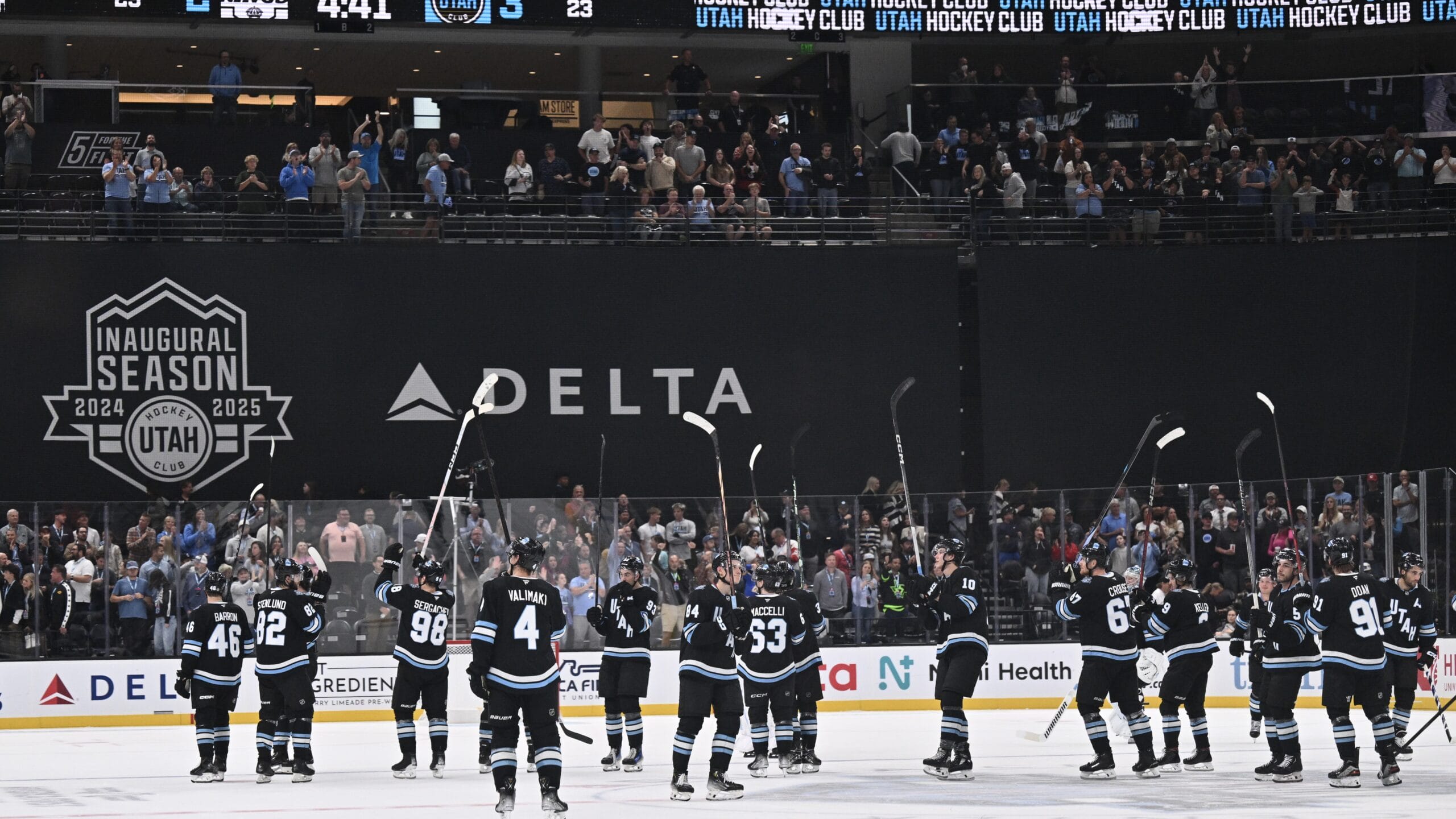 SALT LAKE CITY, UTAH - SEPTEMBER 23: The Utah Hockey Club salutes the fans after defeating the Los Angeles Kings in overtime in a preseason game on September 23, 2024 at Delta Center in Salt Lake City, Utah. (Photo by Jamie Sabau/Getty Images)